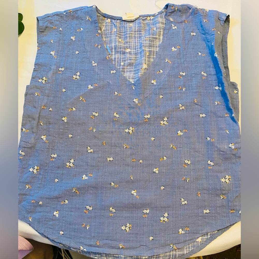 A.n.a top with flowers